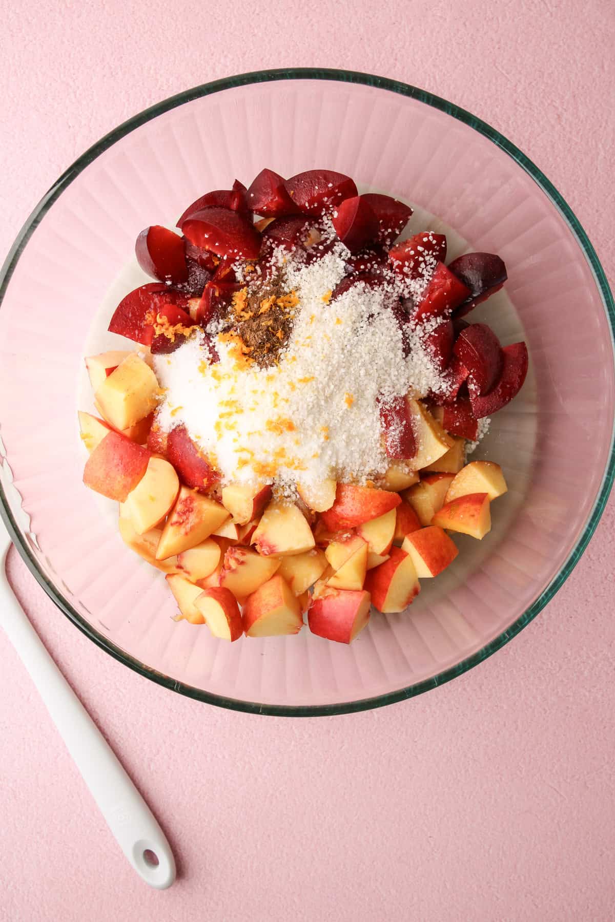 The ingredients for the filling for a nectarine plum pie.