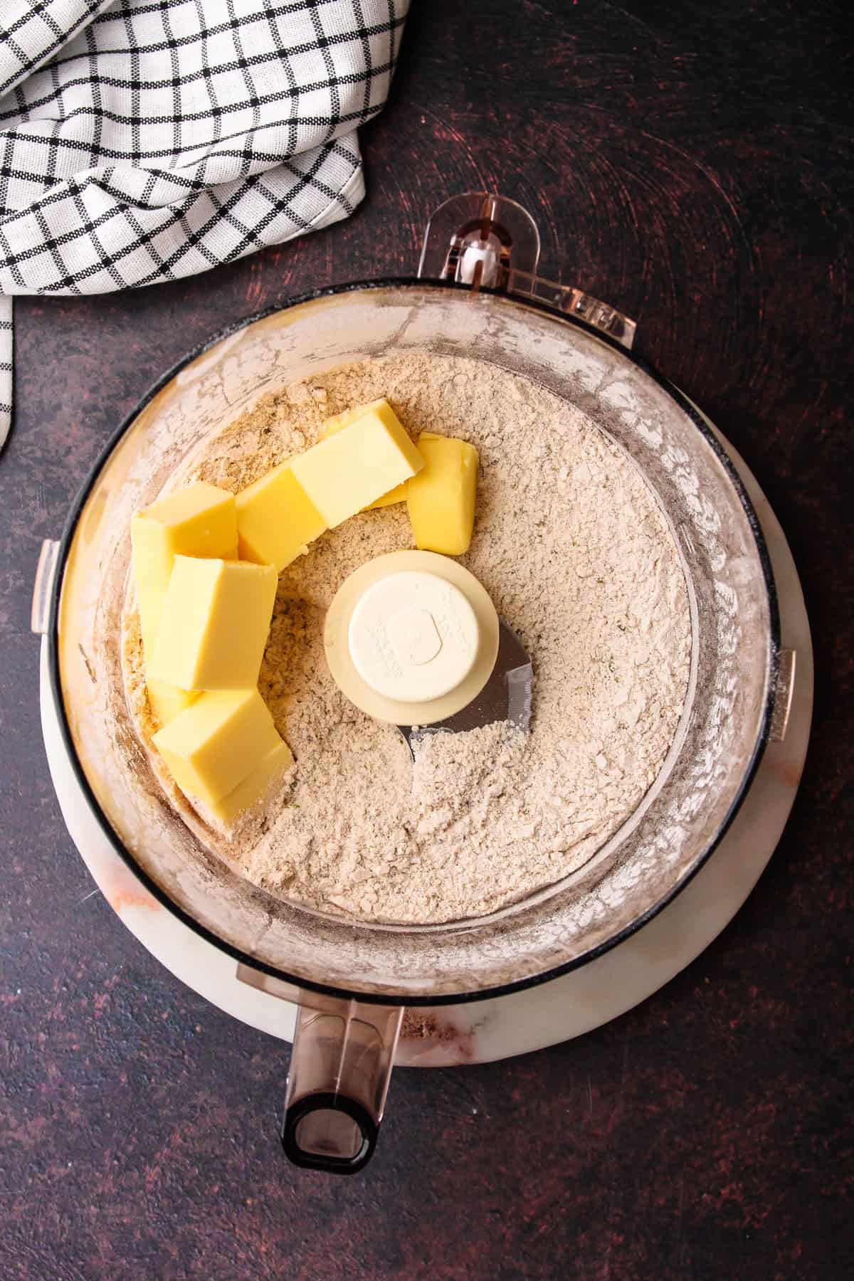 Butter added to the dry ingredients to make a shortbread crust.