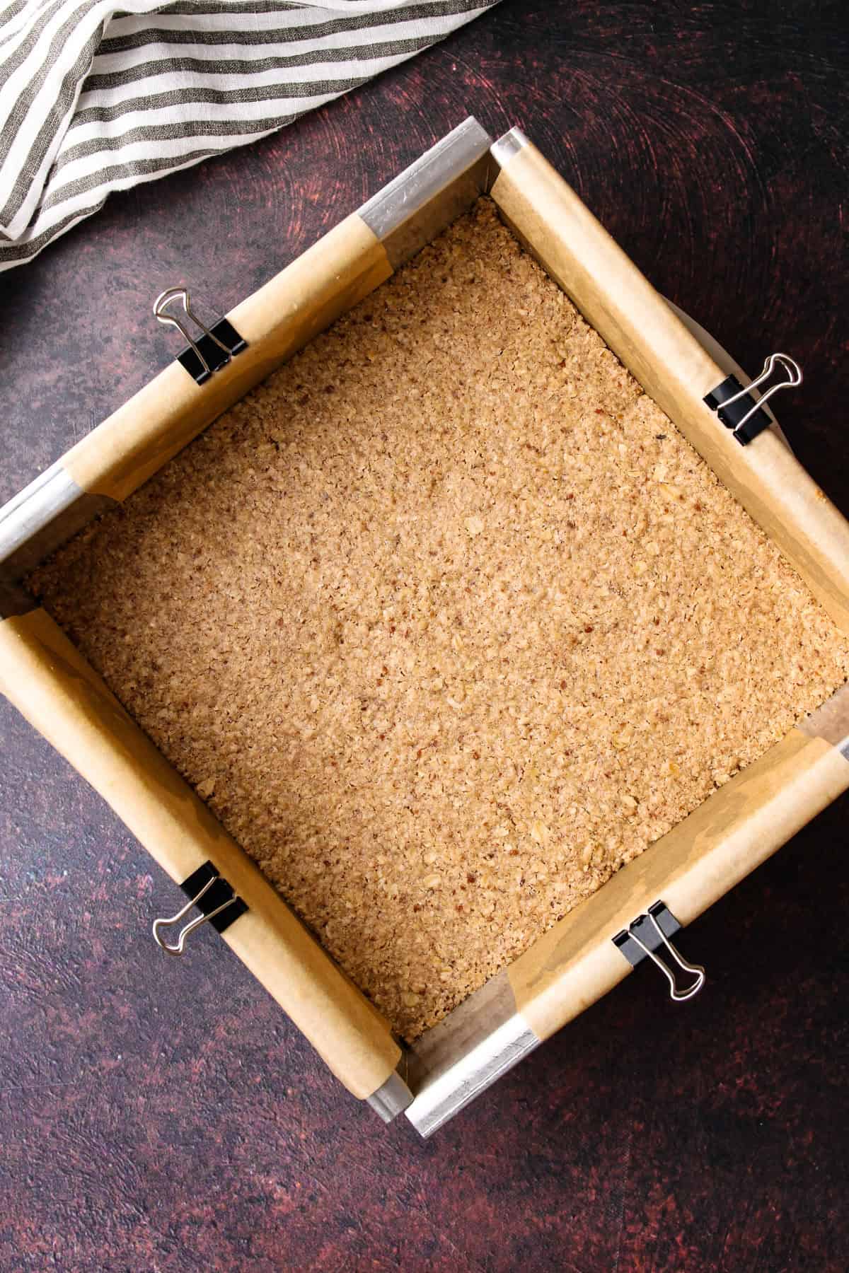 The baked crust for the sweet potato pie bars.