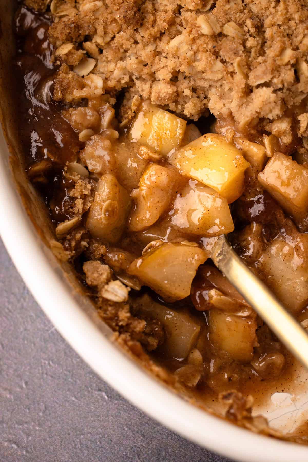 A reveal of the baked filling for an apple pear crisp recipe.