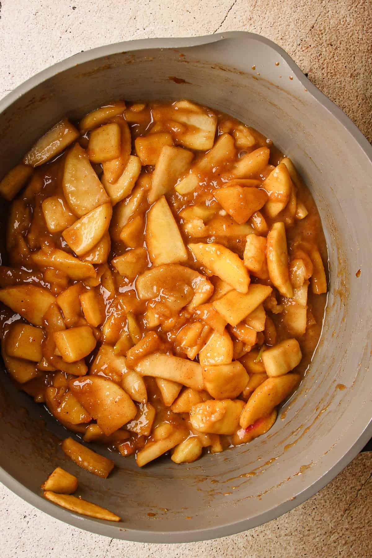 An apple pie filling cooked on the stovetop.