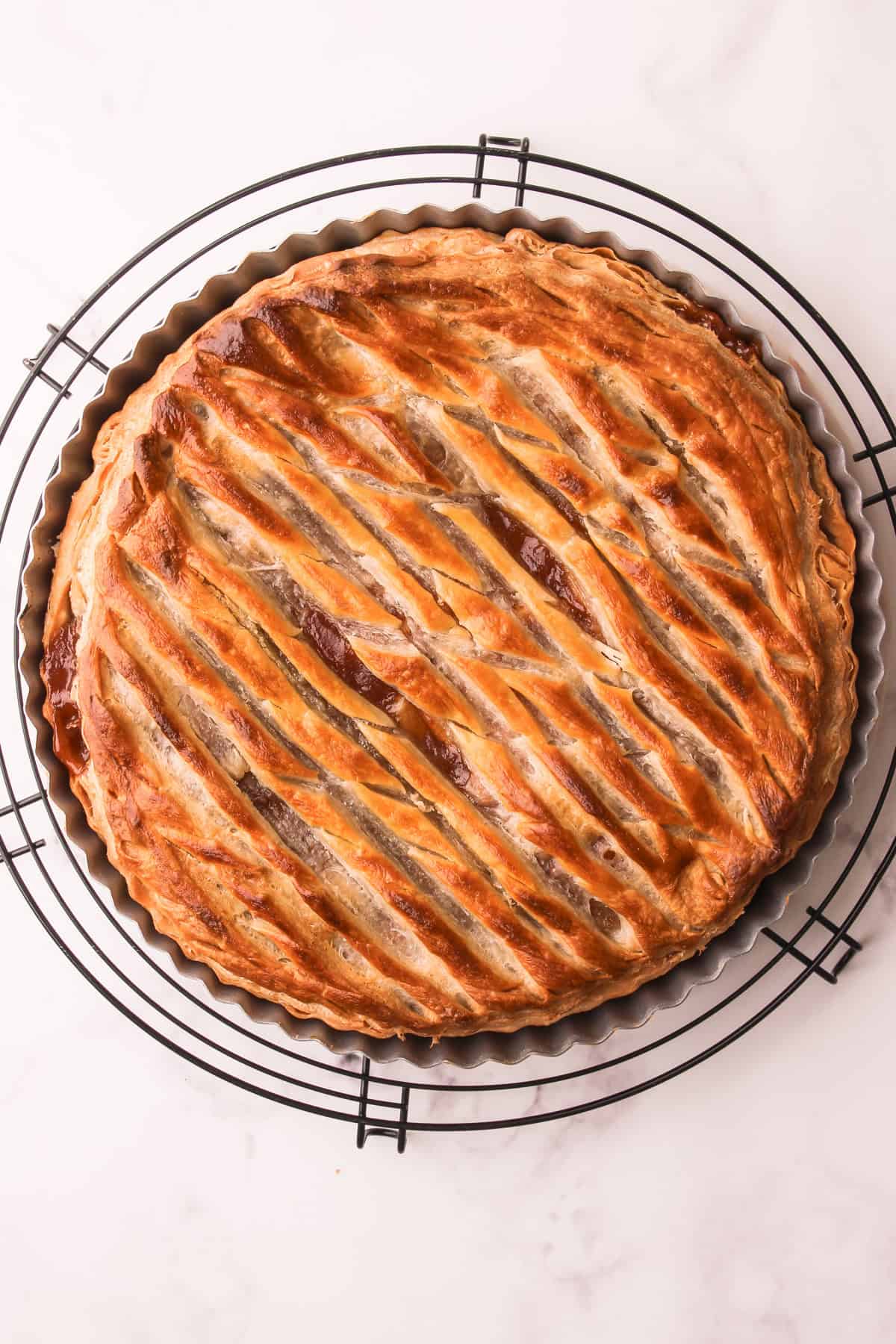 A baked apple pie made with puff pastry.