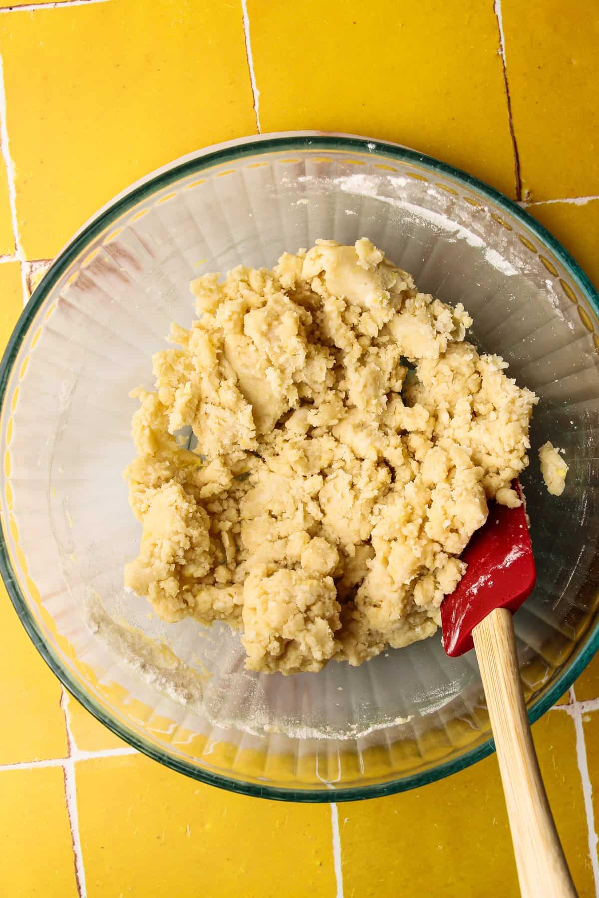 The raw shortbread crumbs in a bowl for Lemon Pie Bars.