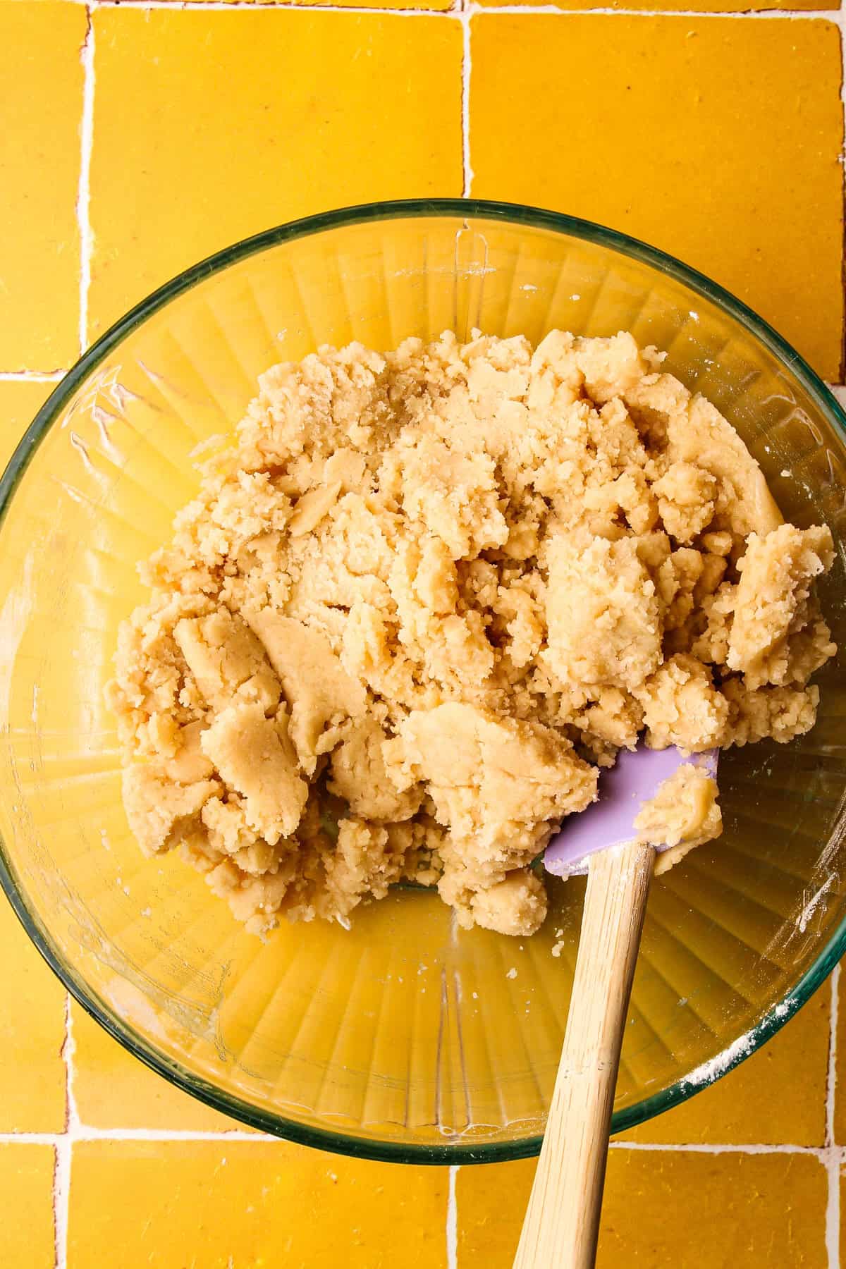 The dough for the crust mixed in a bowl.